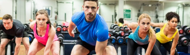 People working out in a gym.