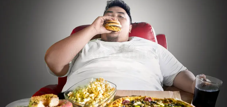 Man surrounded by fast food